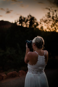 Christy taking a moment to photograph the night sky following her ceremony
