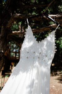 Close up of dress hanging from tree of Flagstaff home