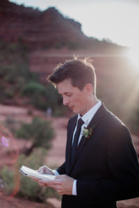 Dustin reading over his wedding vows