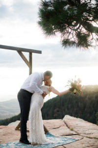 first kiss at mountain side elopement